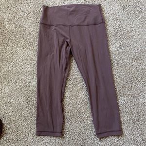 Lululemon sign crops in “Cola”